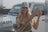 Woman holding a Clix Wipers box in front of a Jeep