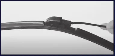 Slide the new blade on until the dimple locks