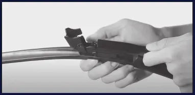 Slide the arm into the connector